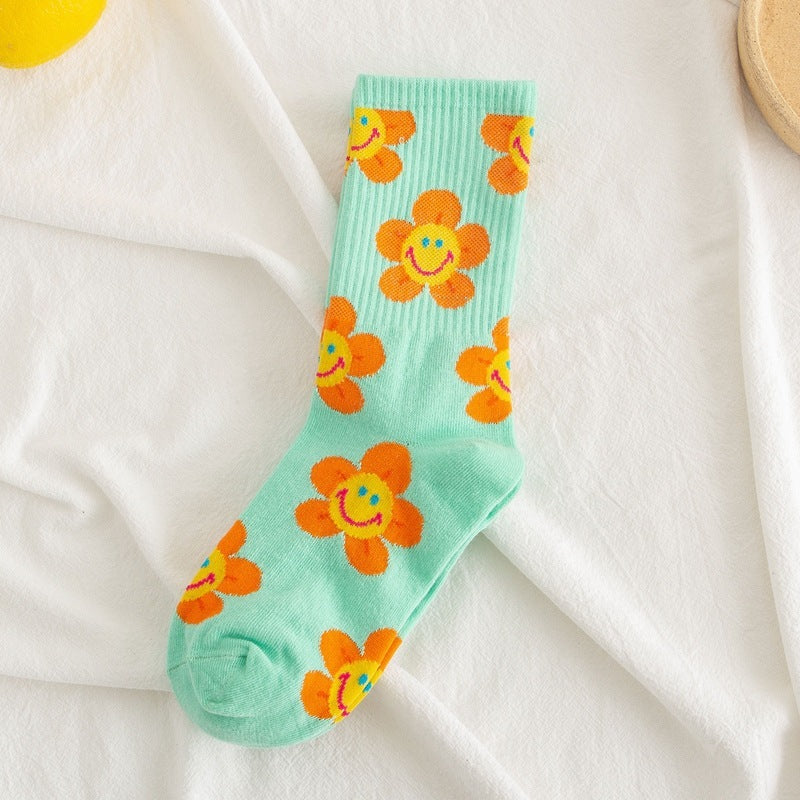 La traduction en français de "Socks Women's Smiling Flower FemalChaussettes Femmes Fleur Souriante Chaussettes Femmes Tournesol Chaussettes Jacquard